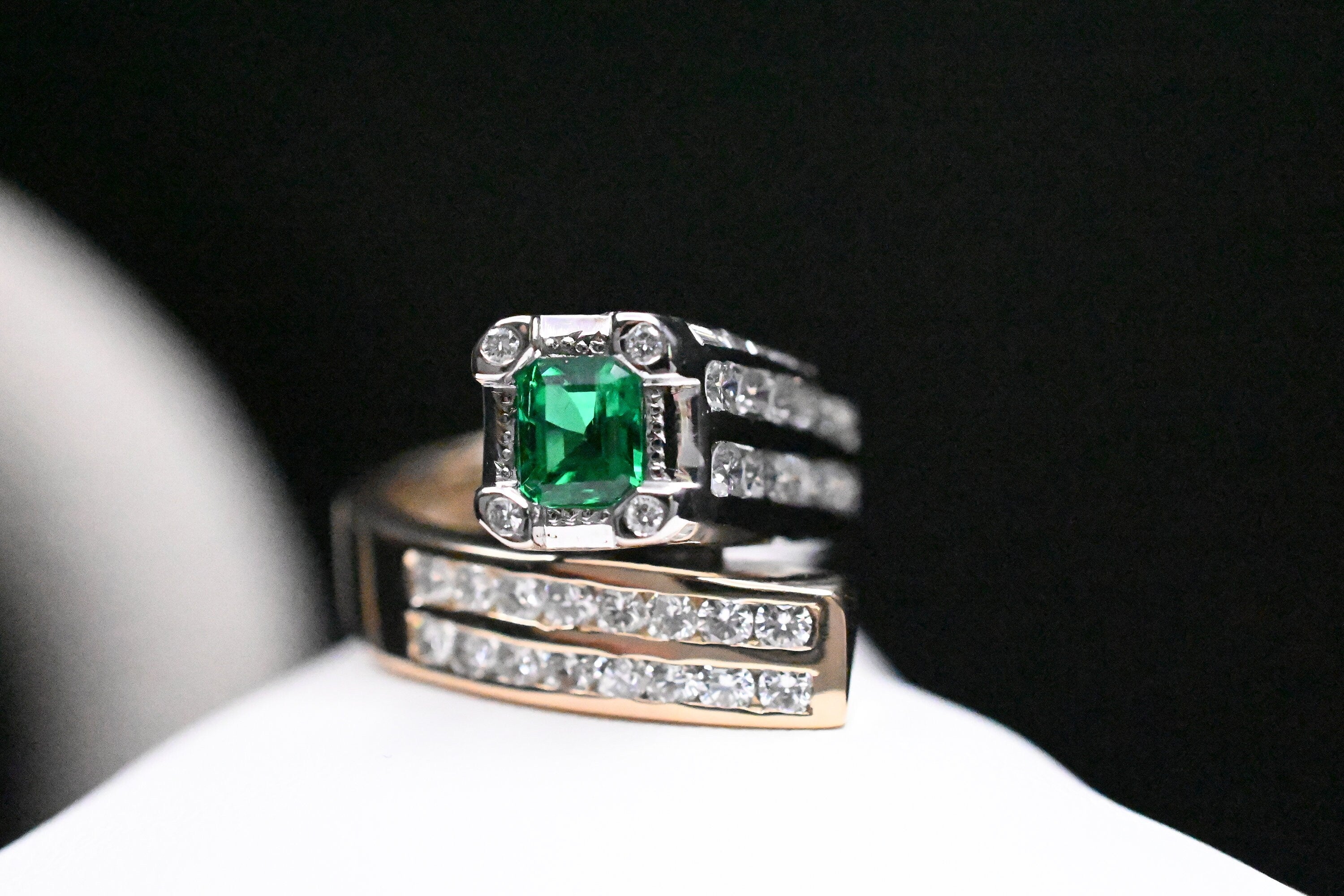 Two-Tone Twist Ring with Colombian Emerald & Diamond Accents