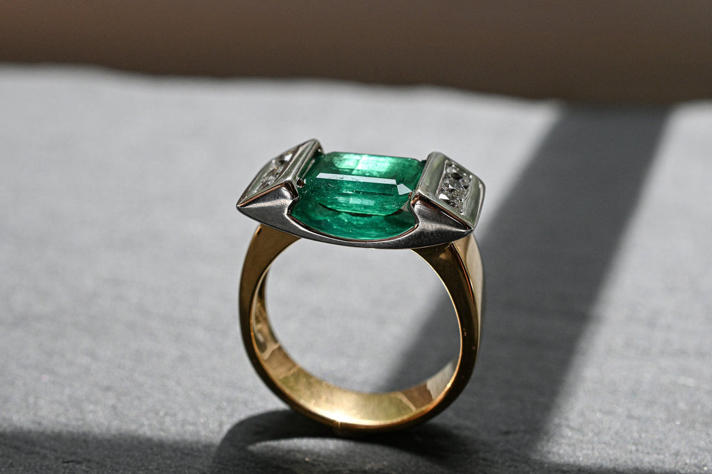 Half Bezel Set Emerald Diamond Ring
