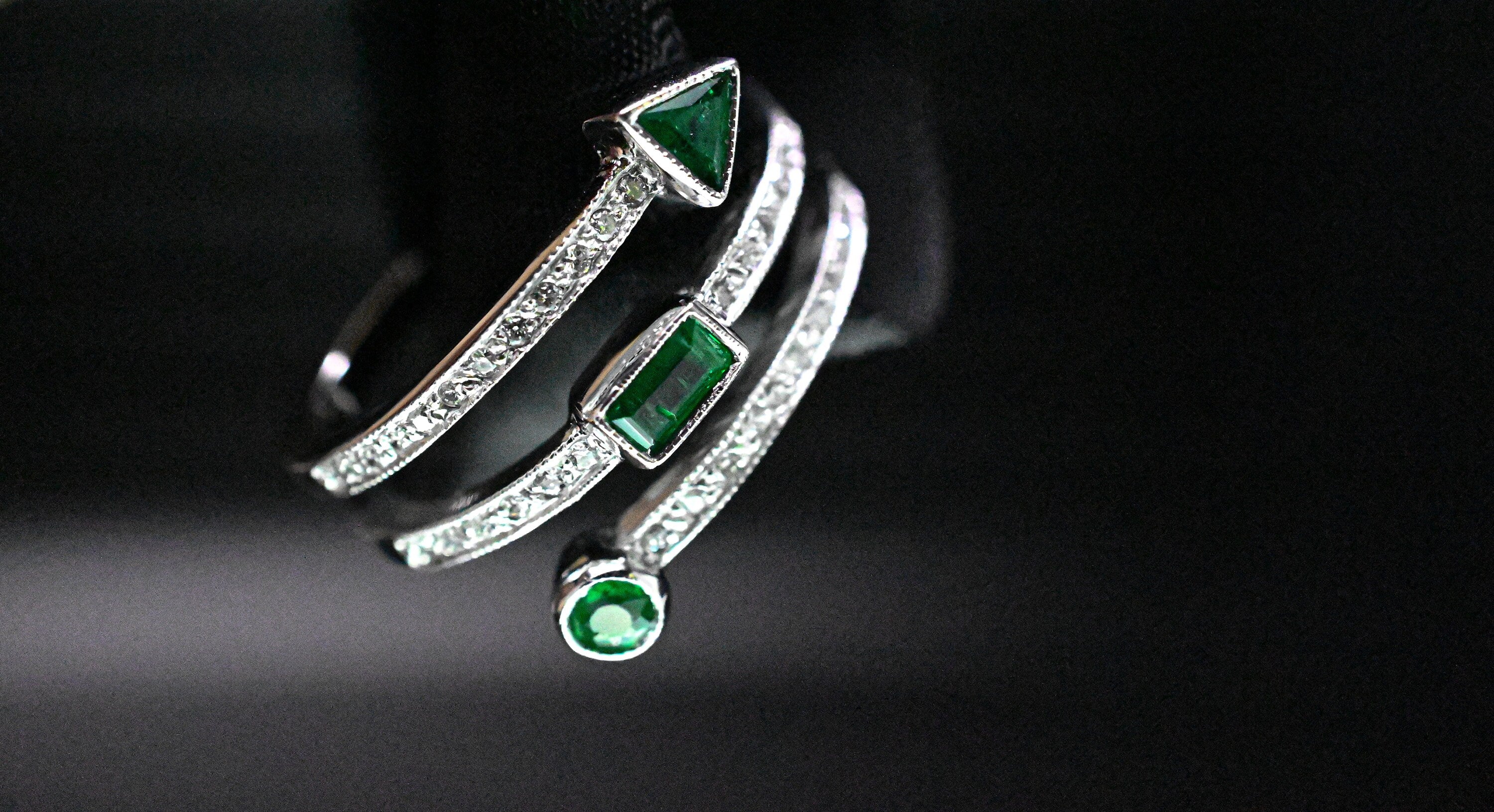 Triple Row Spiral Diamond & Geometric Emerald Ring