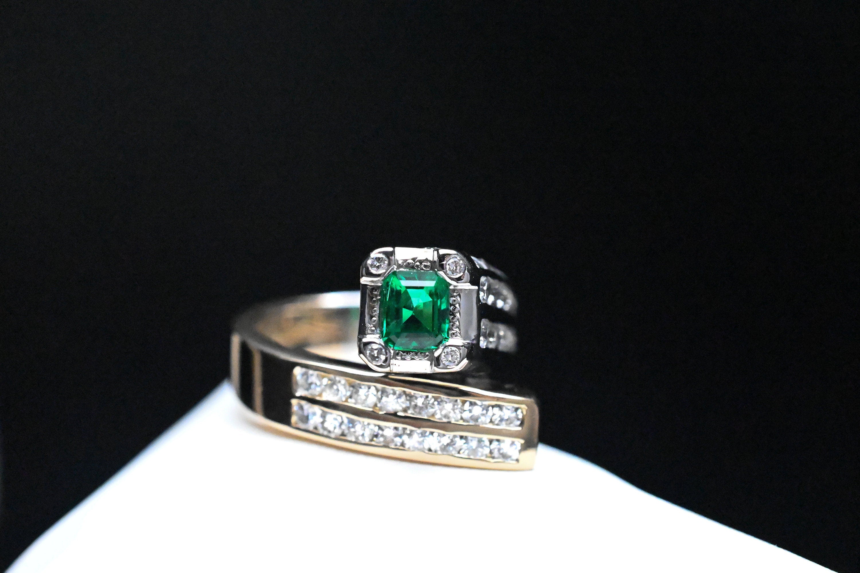 Two-Tone Twist Ring with Colombian Emerald & Diamond Accents