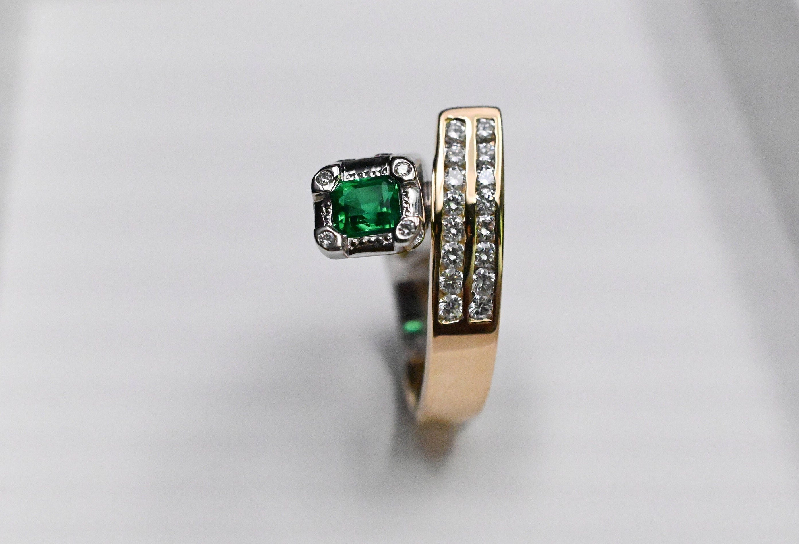 Two-Tone Twist Ring with Colombian Emerald & Diamond Accents